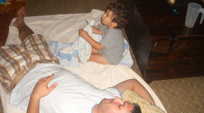 Making a bed with dad